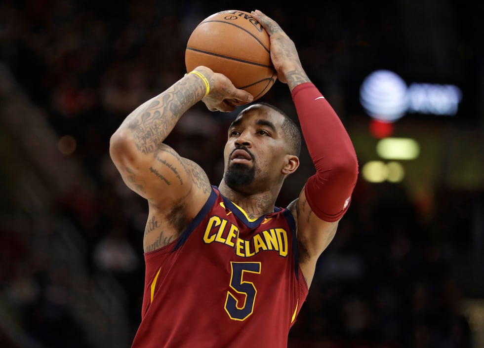 FILE - In this Jan. 28, 2018, file photo, Cleveland Cavaliers' JR Smith shoots against the...