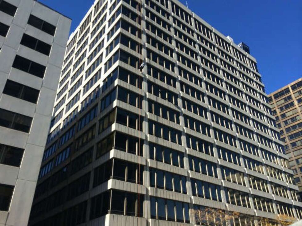 Window washer rescued in downtown Cleveland. (Source: WOIO)