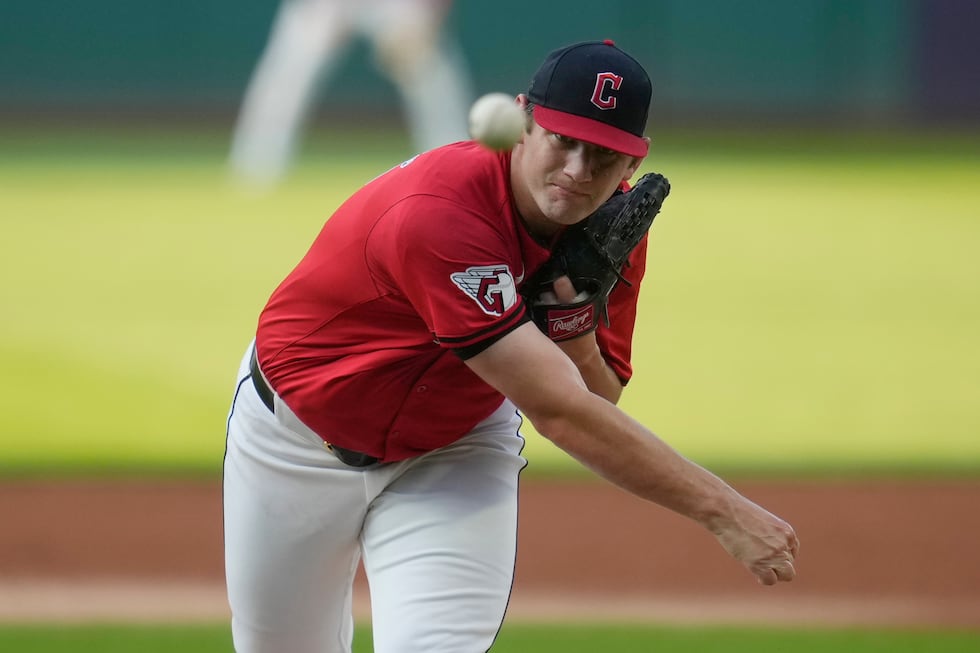 Cleveland Guardians' Gavin Williams pitches in the first inning of a baseball game against the...