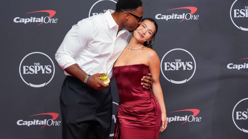 Myles Garrett, left, and Chloe Kim arrive at the ESPY Awards at Lincoln Center on Wednesday,...