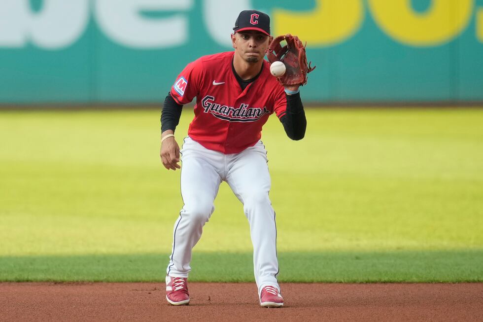 Cleveland Guardians second baseman Andres Gimenez fields a ground ball hit for an out by...
