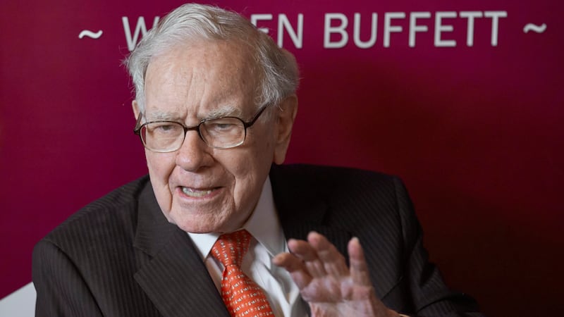 FILE - In this May 5, 2019, file photo Warren Buffett, Chairman and CEO of Berkshire Hathaway,...