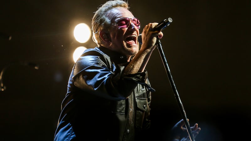 FILE - Bono of U2 performs at the Innocence + Experience Tour at The Forum in Inglewood,...