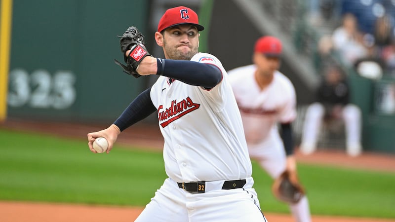 Cleveland Guardians starting pitcher Gavin Williams delivers against the Athletics during the...