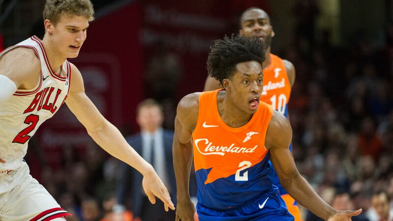 Cleveland Cavaliers' Collin Sexton (2) drives past Chicago Bulls' Lauri Markkanen (24) during...