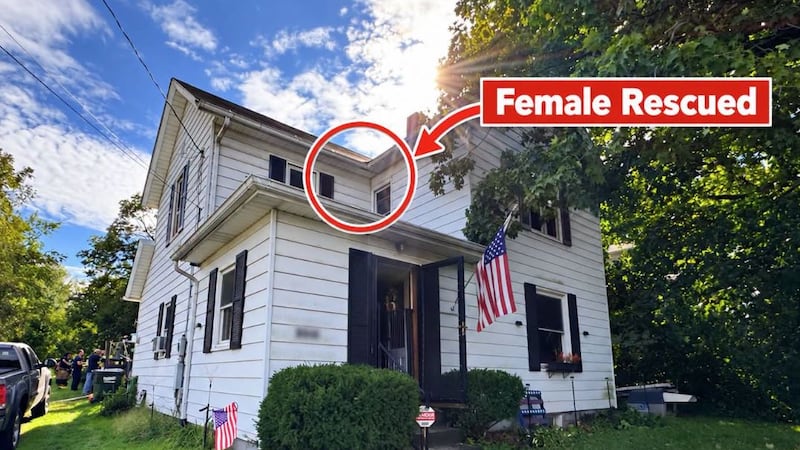 Woman rescued from house fire