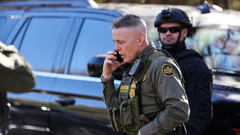 U.S. Border Patrol Commander at large Gregory Bovino takes a phone call, Monday, Nov. 17,...