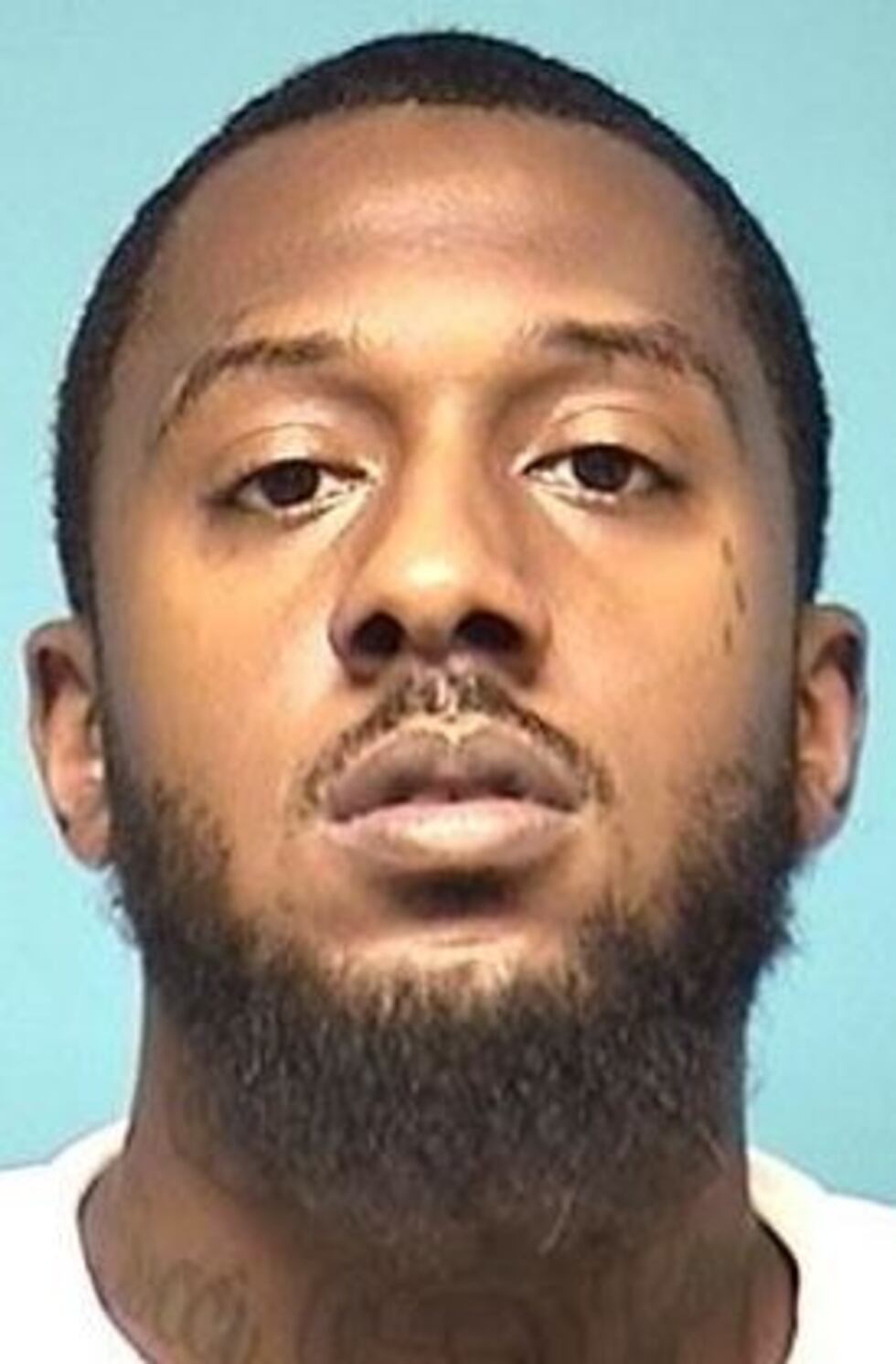 Accused of shooting a man inside a Lorain bar on April 11, 2021.