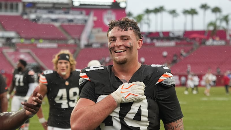 Cleveland Browns defensive tackle Mason Graham (94) leaves the field following an NFL football...