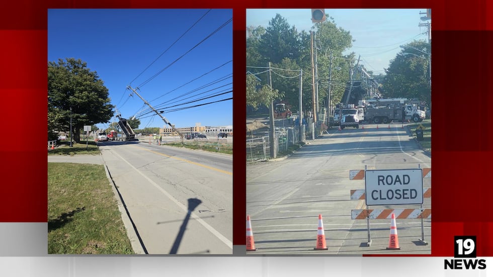 Road closure due to dump truck striking overhead powerlines