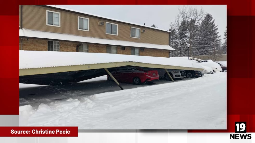 A parking canopy collapsed on several cars Monday at an apartment complex in Canton.