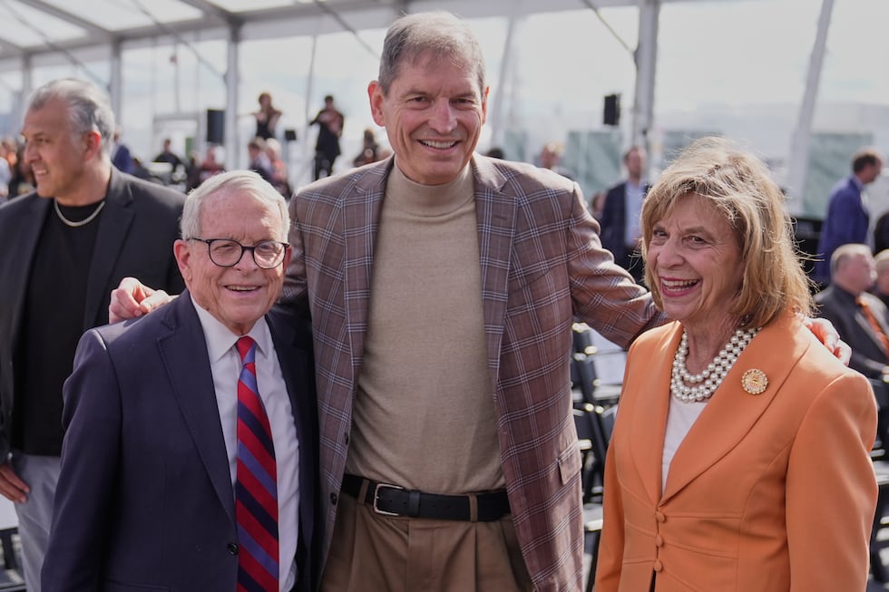 Ohio Gov. Mike DeWine, left, and his wife, Frances Struewing, right, pose for a photo with...