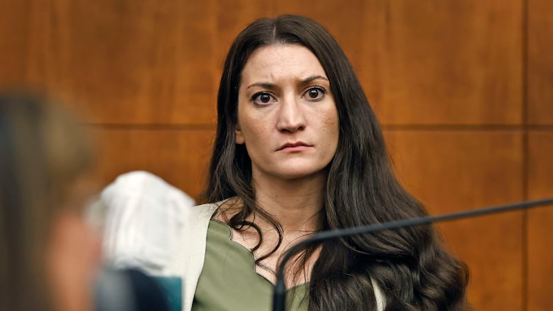 Lindsay Clancy waits for the judge to call a prospective jury member into court in her murder...