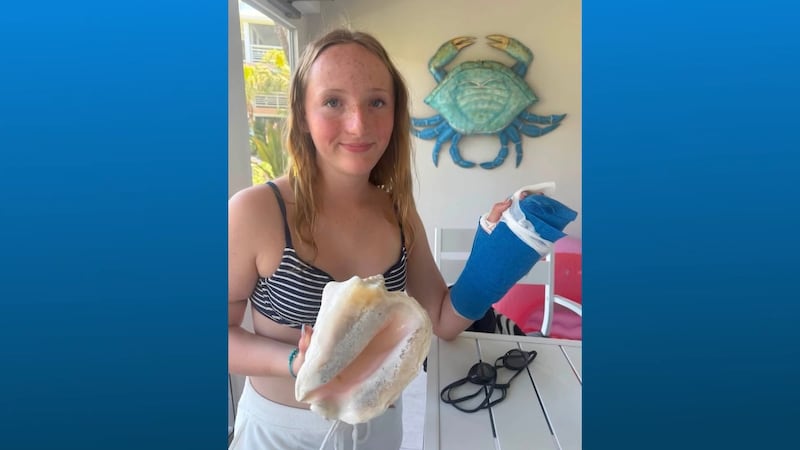Claire Macdonel, 13, was bitten by a barracuda while doing a handstand in shallow water at a...