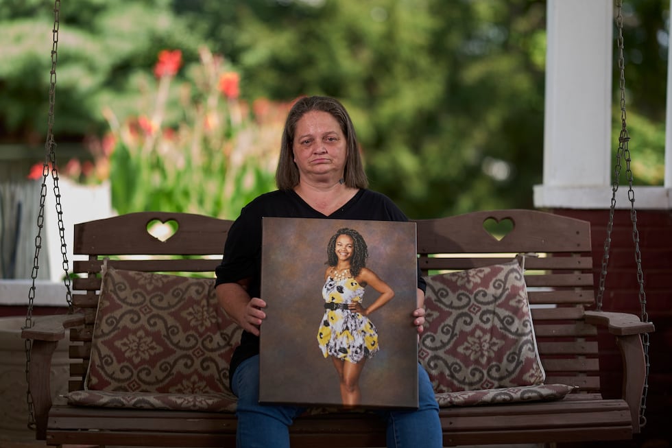 Christy Spivey poses with a portrait of her late daughter, Tasia Fortune, on Tuesday, Sept. 8,...