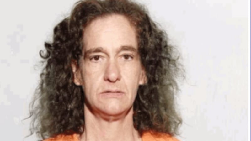 Toledo woman charged after lighter-fluid attack