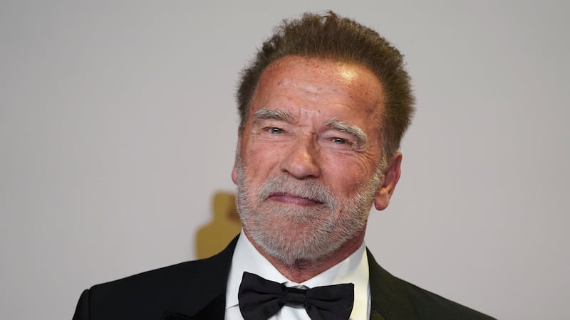 Arnold Schwarzenegger poses in the press room at the Oscars on Sunday, March 10, 2024, at the...