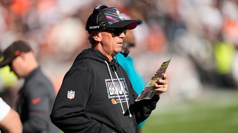 Cleveland Browns head coach Todd Monken looks at the play sheet during the second half of an...