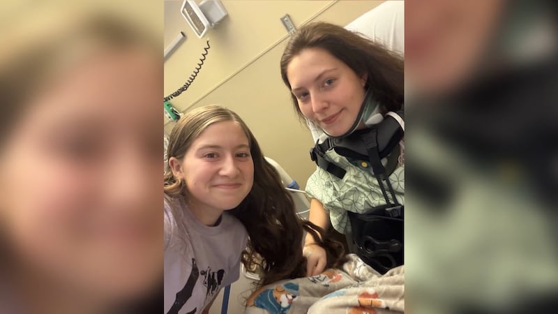 Kyra Kinnison (right) survived falling 70 feet from an overpass while trying to avoid being...