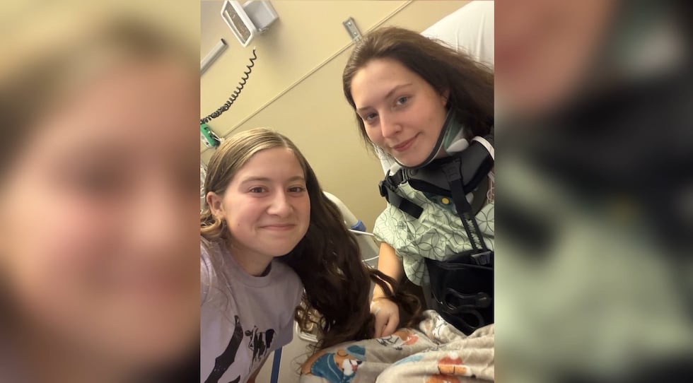 Kyra Kinnison (right) survived falling 70 feet from an overpass while trying to avoid being...