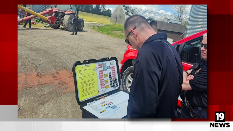 Paramedics and the fire crew received assistance with using the grain rescue sleeve from the...
