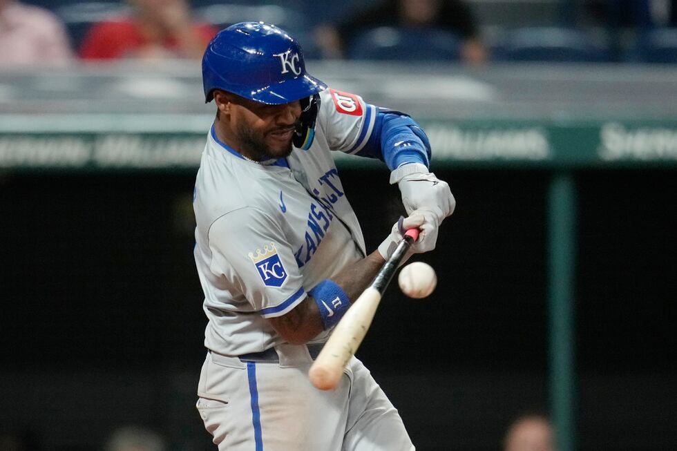 Kansas City Royals' Maikel Garcia hits a single in the seventh inning of a baseball game...