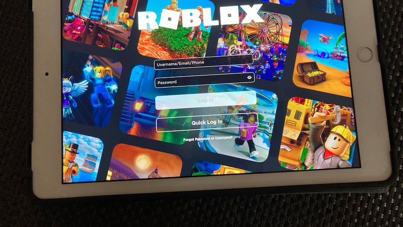 FILE - The gaming platform Roblox is displayed on a tablet, Oct. 30, 2021, in New York.