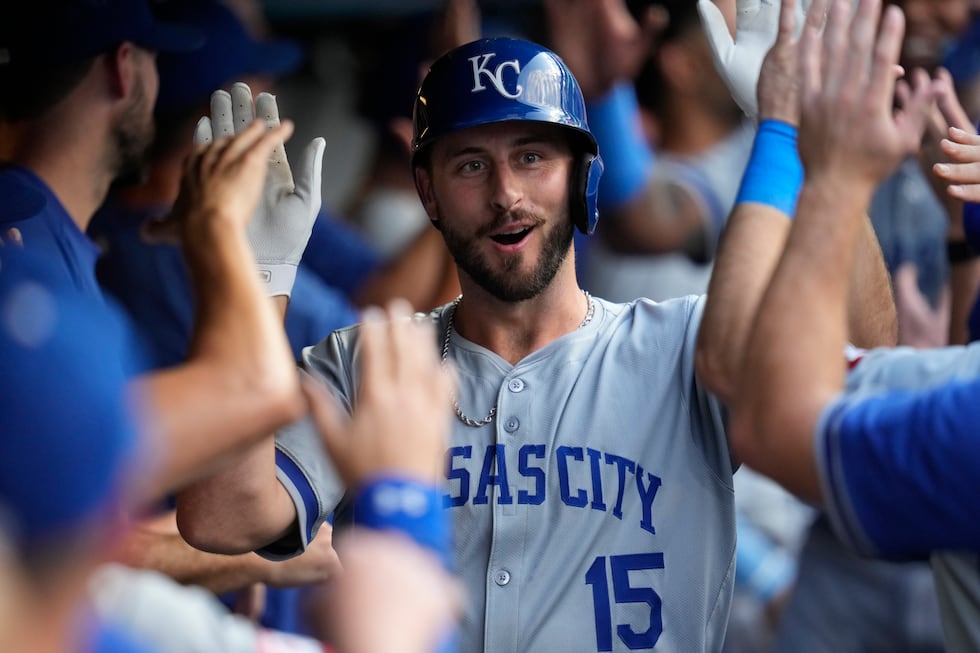 Kansas City Royals' Paul DeJong celebrates his home run in the second inning of a baseball...