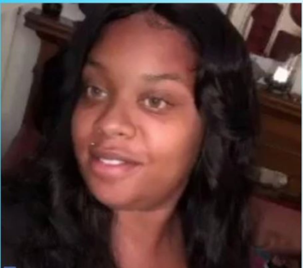 Mother shot and killed while driving with her children.