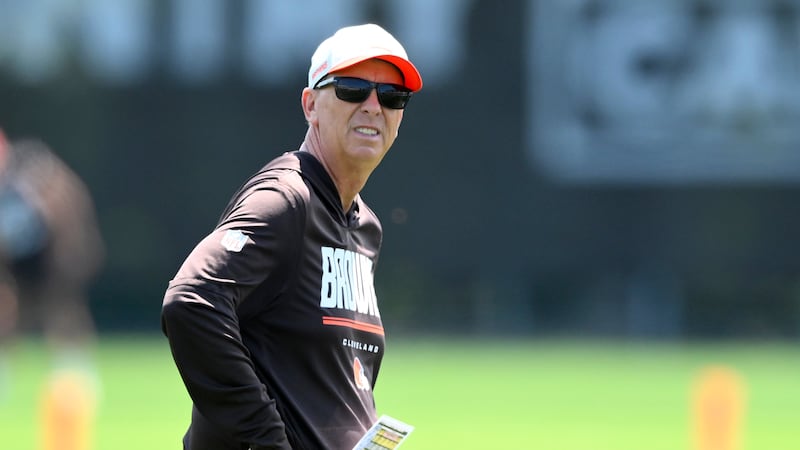 Cleveland Browns head coach Todd Monken stands on the field during the team's NFL football...
