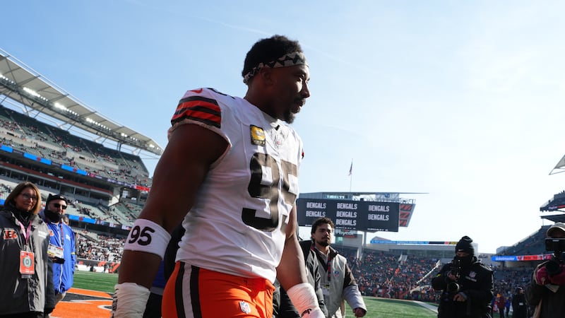 Cleveland Browns defensive end Myles Garrett (95) walks off the field before an NFL football...