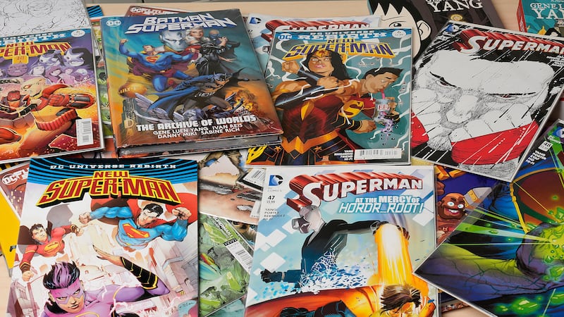 Comic books are displayed in Gene Yang's home Tuesday, April 1, 2025, in San Jose, Calif. (AP...