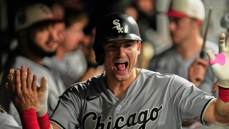 Chicago White Sox's Colson Montgomery celebreates in the duogut after hitting a home run in...