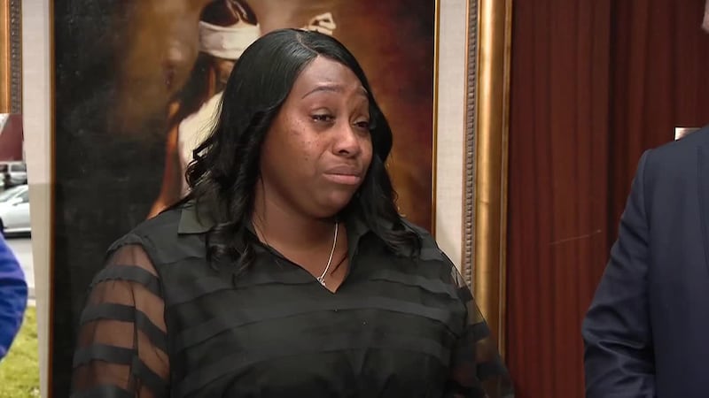Two families are suing a funeral home, alleging one woman was cremated before her viewing and...